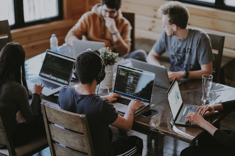 Team collaborating in modern workspace